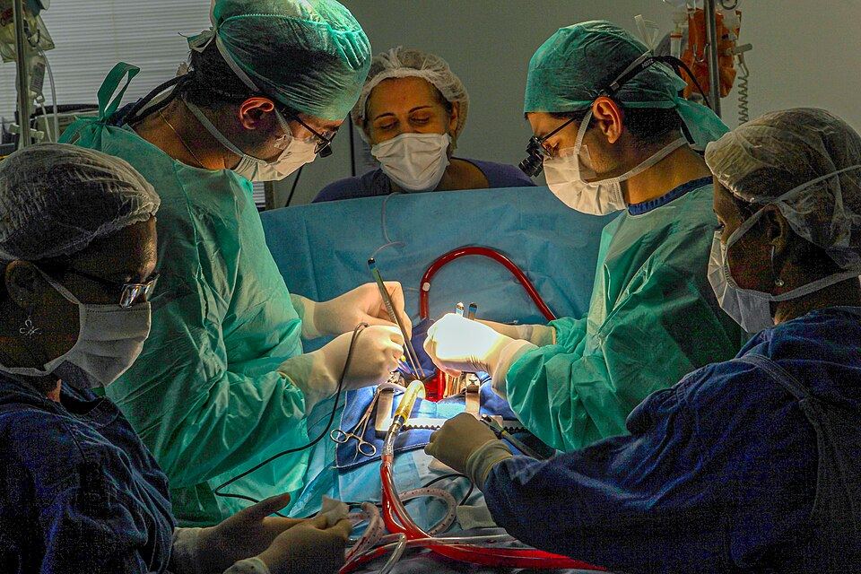 Surgeons at work during a heart transplant operation